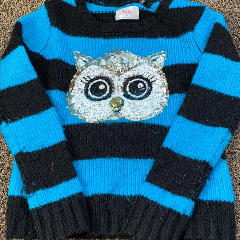 Justice sweater